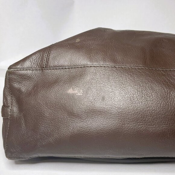 Sophisticated Brown Leather Travel Bag with Gold Accents by Coach - Picture 15 of 16